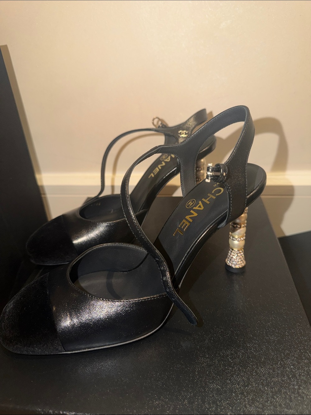 CHANEL Black leather Slingback Pumps with Jeweled Gold Pearl Heel